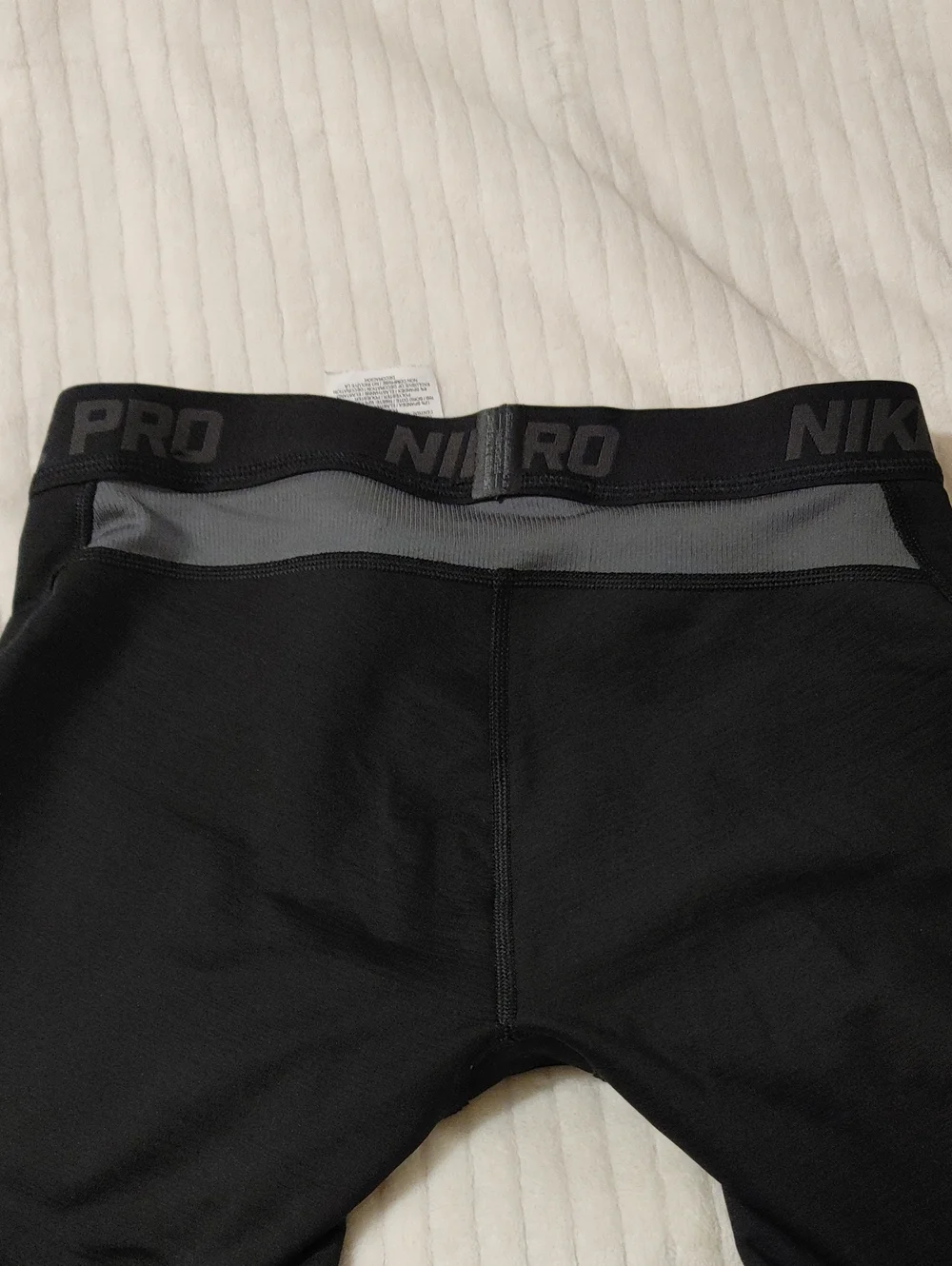 Nike Kids Black Cropped Leggings with White Swoosh